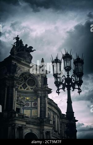 Germany, Saxony, Dresden, view to Semper Opera House with old street lamp in the foreground Stock Photo