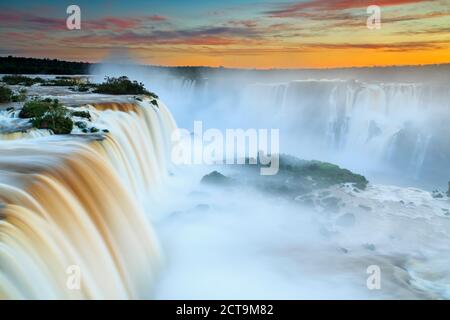 South America, Argentina, Brazil, Iguazu National Park, Iguazu Falls at sunset Stock Photo