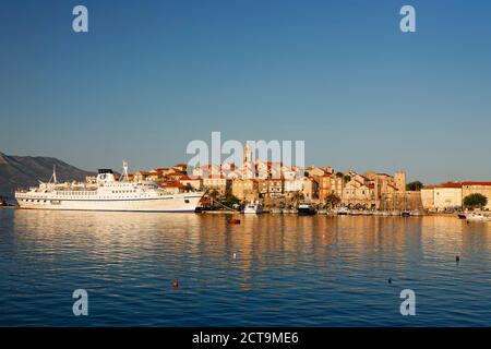Croatia, Dubrovnik-Neretva, Korcula Island, Korcula, Cityscape and harbour in the evening Stock Photo