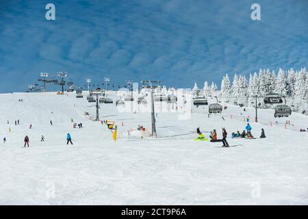 Germany, Baden-Wuerttemberg, Black Forest, Feldberg, Ski lift and ski run in winter Stock Photo