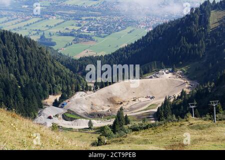 Germany, Bavaria, Upper Bavaria, Bavarian Prealps, Isarwinkel, construction site, reservoir for snowmaking at Brauneck near Lenggries Stock Photo