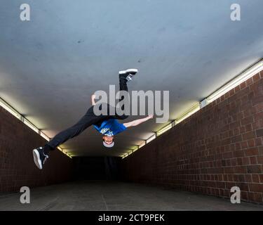 Young breakdancer in underpass Stock Photo