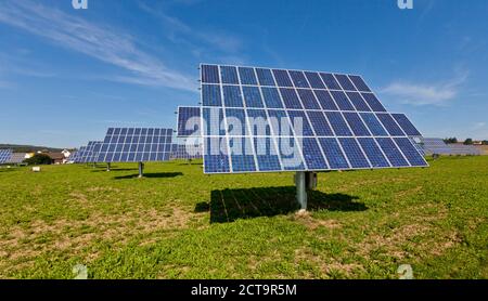 Germany, Bavaria, Solar panels on grass Stock Photo
