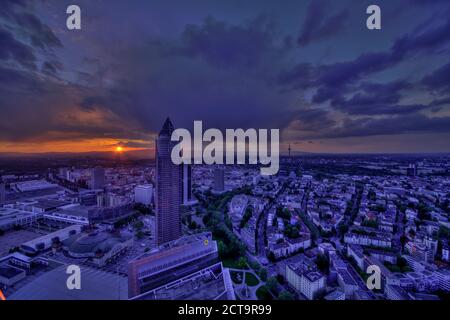 Germany, Hesse, Frankfurt am Main, Trade Fair Tower and city view at sunset Stock Photo