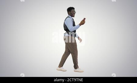 Smiling African American businessman making video call holding m Stock Photo