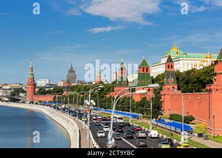 Russia, Moscow, River Moskva, street and Kremlin wall with towers Stock Photo