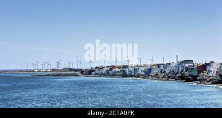 Spain, Canary Islands, Gran Canaria, Santa Lucia de Tirajana, Pozo with wind turbines Stock Photo