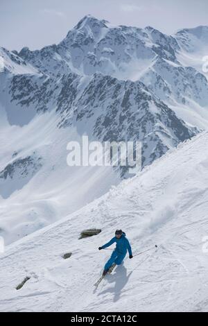 Austria, East Tyrol, Defereggental, Man telemark skiing Stock Photo
