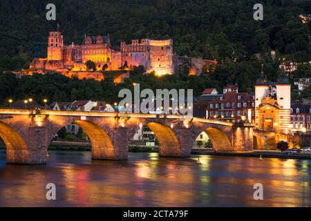 Germany, Baden-Wuerttemberg, Heidelberg, View to Old town, Old bridge and Heidelberg Castle in the evening Stock Photo