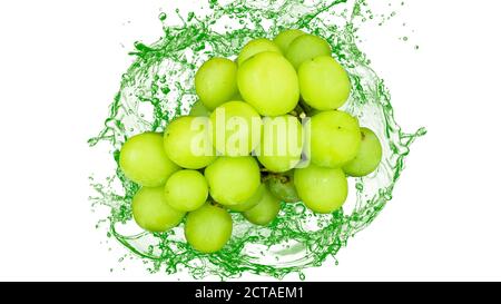 Fruit green grape and water splash on white background. Stock Photo