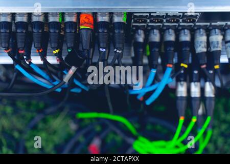 Audio jacks cable plugged into mixer console. XLR audio jacks cable Stock Photo