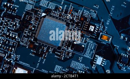 Macro Close-up Shot of Microchip, CPU Processor on Printed Circuit Board / Computer Motherboard with Components Inside of Electronic Device, Parts of Stock Photo