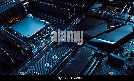 Macro Shot of Printed Circuit Board with Computer Motherboard Components: Microchip, CPU Processor, Transistors. Inside of Electronic Device, Parts of Stock Photo