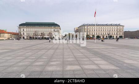 Warsaw, Poland - October 19, 2019: Tourists visit Pilsudski square in Warsaw downtown Stock Photo