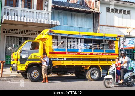 Phuket, Thailand - 26 February 2018: Yellow school bus waiting for passengers Stock Photo