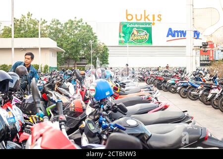 Phuket, Thailand - 26 February 2018: Many motorbikes parking lot and people Stock Photo