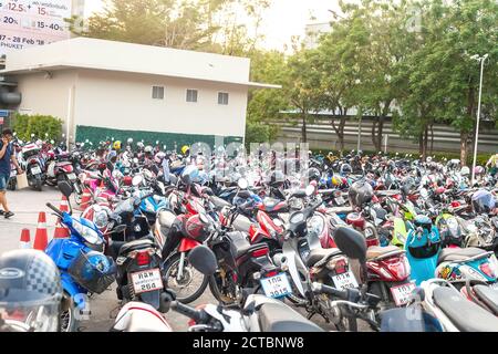 Phuket, Thailand - 26 February 2018: Many motorbikes parking lot and people Stock Photo