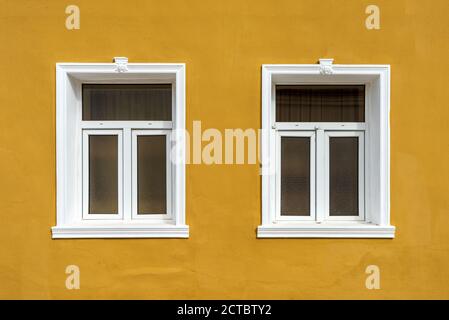 Window with a mosquito net in the wall Stock Photo