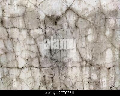 Grey Concrete Texture old wall background with peeling paint, scratches and cracks Stock Photo