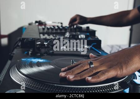 Dj mixes the track in the nightclub Stock Photo