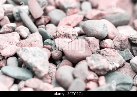 abstact background texture of natural pebble stone. Toned pink Stock Photo