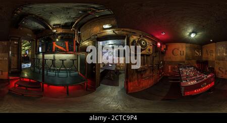 360 degree panoramic view of MINSK, BELARUS - MAY, 2018: full seamless hdri panorama 360 degrees angle view in interior of elite sports bar in steampunk style in equirectangular p