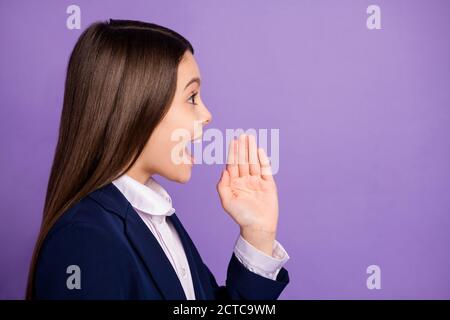 Close-up profile side view portrait of her she nice lovely cute cheerful long-haired girl saying good news rumour advert promo isolated bright vivid Stock Photo