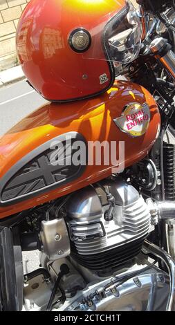Bordeaux Aquitaine France 09 20 2020 Royal Enfield vintage motorbike orange color with engine motor detail and colorful motorcycle helmet Stock Photo Alamy