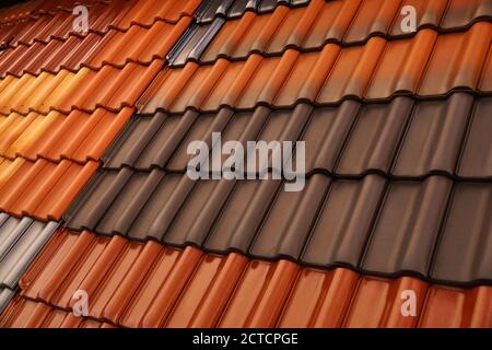 Different colored roof tiles. Glossy, matte and textured surface. Stock Photo