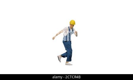 Young construction worker in yellow hardhat break dancing lookin Stock Photo