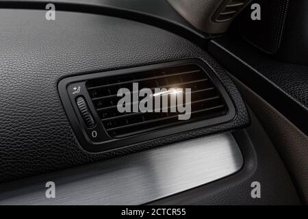 Air duct grille or heater or air conditioner deflector in the front panel of the car. Stock Photo