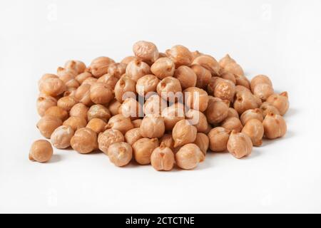 Handful of chickpea seeds close up isolated on white background Stock Photo