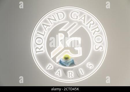 Illustration of official tennis ball Roland Garros 2020 by Wilson with Roland Garros lighting logotype pictured with chirurgical protector mask, swab Stock Photo