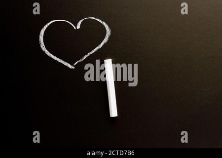 A chalk board with the drawn heart. Background texture with copy space Stock Photo