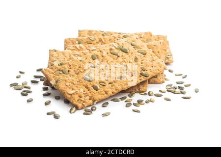 The  crispy bread with pumpkin seeds. Knackebrot isolated on white background. Stock Photo