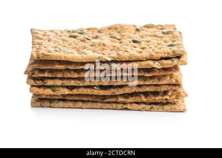 The  crispy bread with pumpkin seeds. Knackebrot isolated on white background. Stock Photo