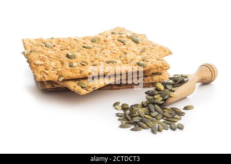 The  crispy bread with pumpkin seeds. Knackebrot isolated on white background. Stock Photo