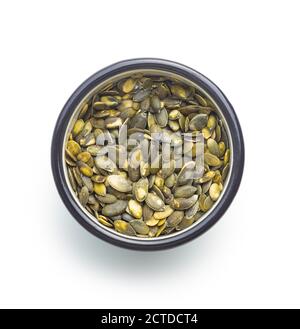 Peeled pumpkin seeds isolated on white background. Stock Photo