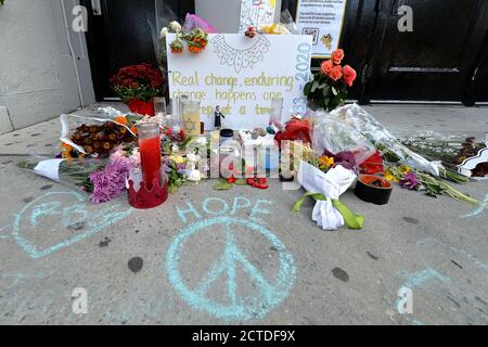 New York City, USA. 22nd Sep, 2020. A makeshift memorial for Ruth Bader Ginsburg, recently deceased Associate Chief Justice of the Supreme Court of the United States of America, is set up at entrance of James Madison High School where she was once a student, in the Brooklyn borough of New York, NY, September 22, 2020. Chief Justice Ruth Bader Ginsburg died on September 18, 2020.(Anthony Behar/Sipa USA) Credit: Sipa USA/Alamy Live News Stock Photo