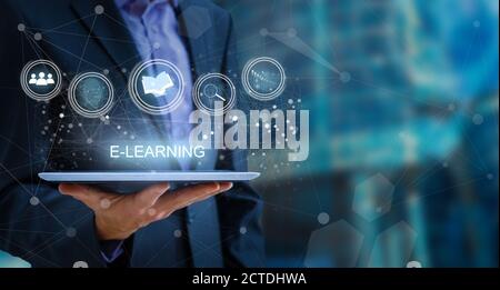 hand pressing learning word button. business concept. e learning Stock Photo