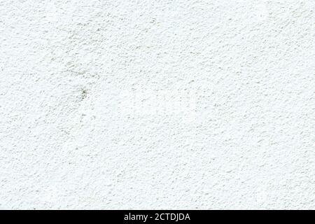 Blank concrete white rough wall for background. Beautiful white cement wall plastered surface background pattern. Stock Photo