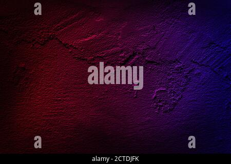 Neon light on cement walls plastered surface background and texture pattern. Lighting effect red and blue neon background of empty concrete wall. Stock Photo