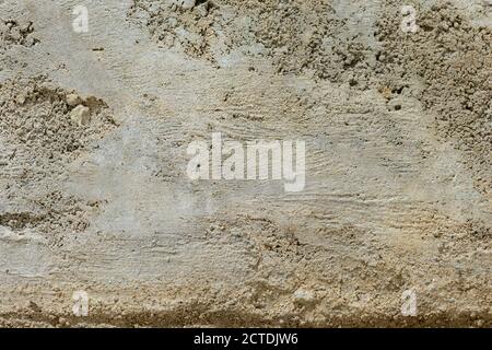 Dirty cement wall plastered surface background and texture pattern. Blank concrete rough wall for background. Stock Photo