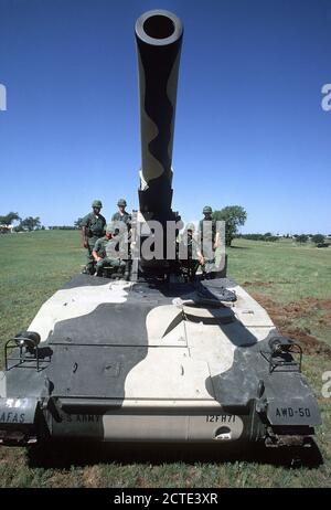 1972 - Crewmen of an M110 203 mm self-propelled howitzer man their positions. Stock Photo