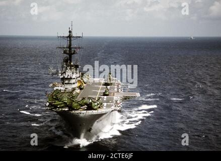 1979 - A bow view of the amphibious assault ship USS IWO JIMA (LPH-2) underway to New York for a Bob Hope show.  The ship and crew has just completed a field exercise in Puerto Rico. Stock Photo