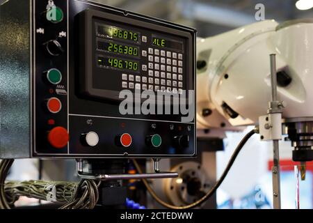 Control panel of CNC drilling and milling center. Selective focus. Stock Photo