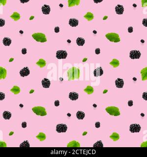 Falling Bramble Seamless pattern. Fresh Falling blackberry seamless pattern. Pattern with fresh wild berries isolated on pink background. Stock Photo
