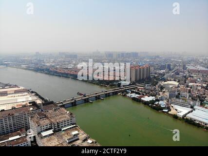 An aerial view of various factories located at a local industrial zone at Ronggui subdistrict, Shunde district, Foshan city, south China's Guangdong p Stock Photo