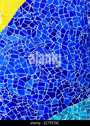 Wall of blue broken tiles mosaic. Stock Photo