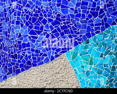 Wall of blue broken tiles mosaic. Stock Photo